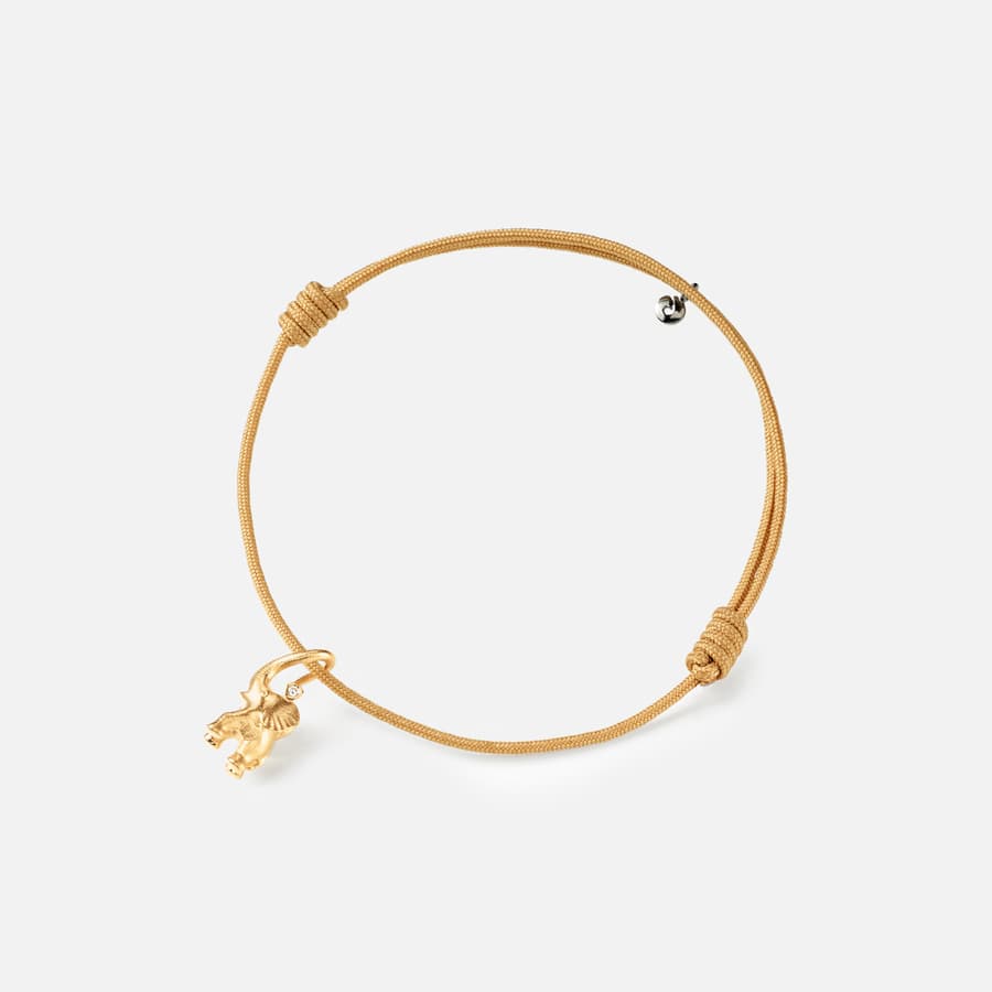 Elephant string bracelet in yellow gold with a diamond on beige nylon string | Ole Lynggaard