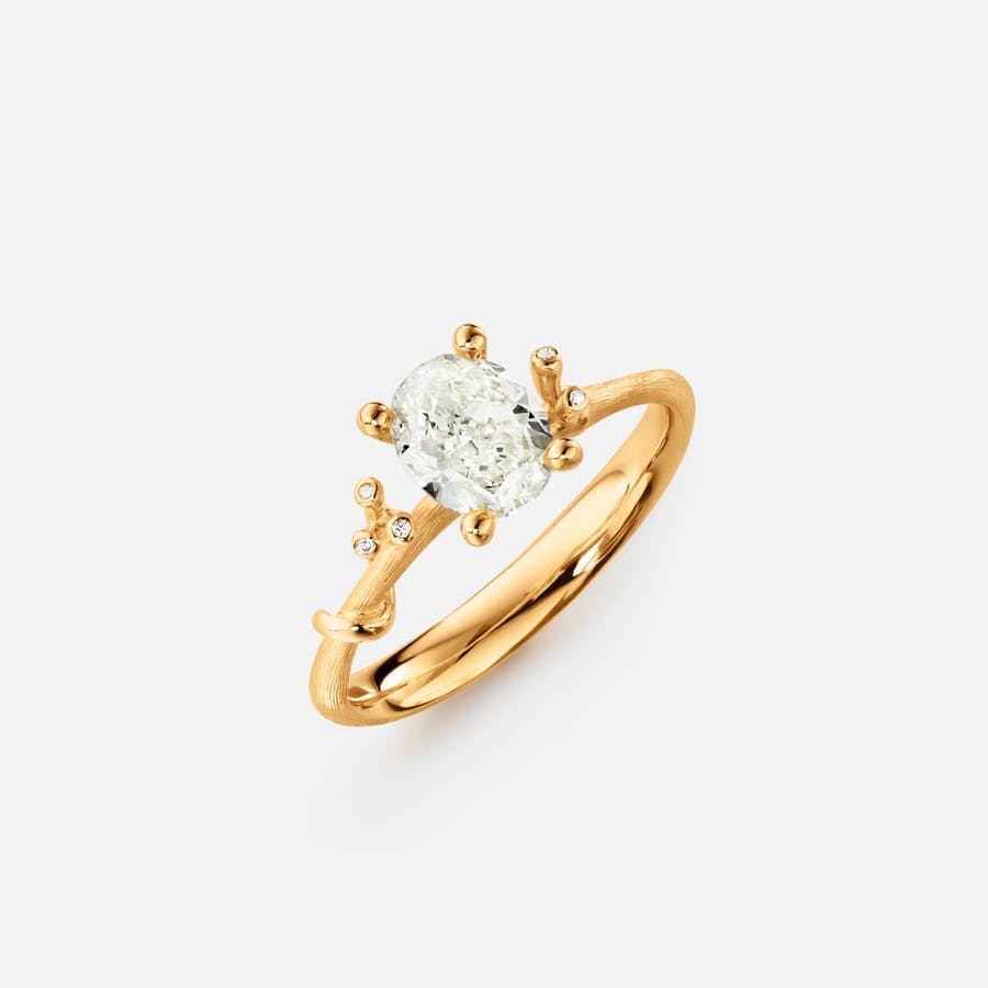 Nature Solitaire ring in 18k Gold with Oval center Diamond and 3 small white Diamonds | Slim shank | Ole Lynggaard Copenhagen